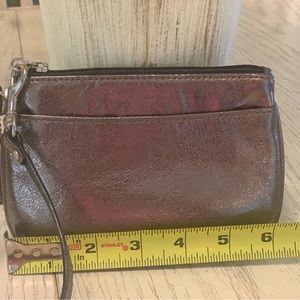 Coach wristlet bronze/Gold metallic leather 6.5x4”like new condition